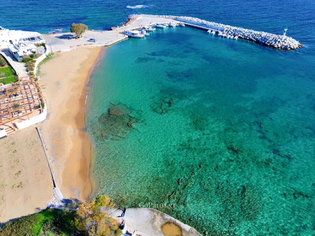 Ampelas Beach, Paros, aerial view of the beach and sheltered bay beside the small harbor and breakwater