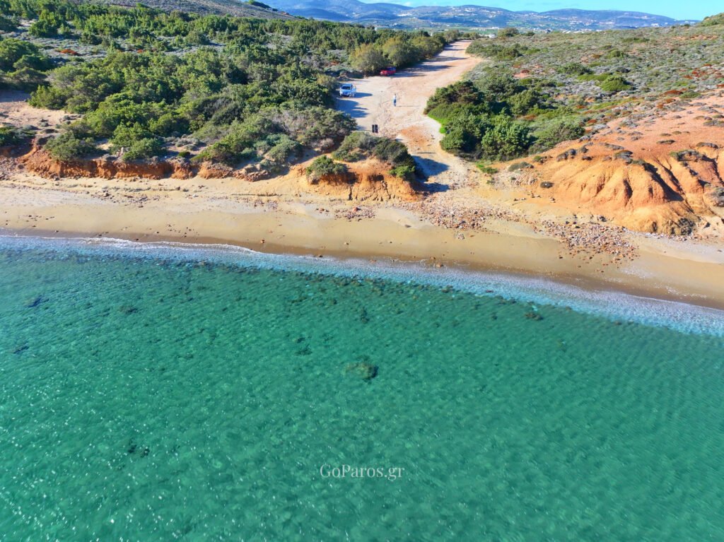 Aerial view of the sandy shoreline and access track leading to Kalogeros Beach, Paros.