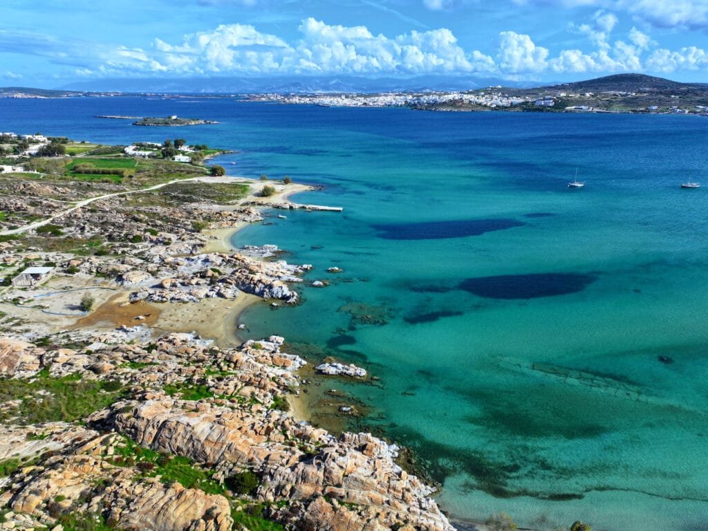 Kolymbithres Beach, Paros with wooden steps down to a small sandy cove and clear blue water