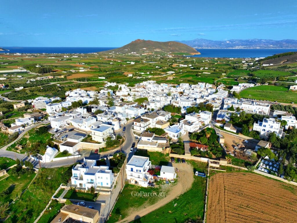 Marmara, Paros, close aerial view of village rooftops around a domed church and bell tower