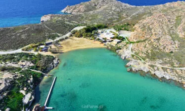 sandy shoreline and gentle waves at monastiri beach, paros