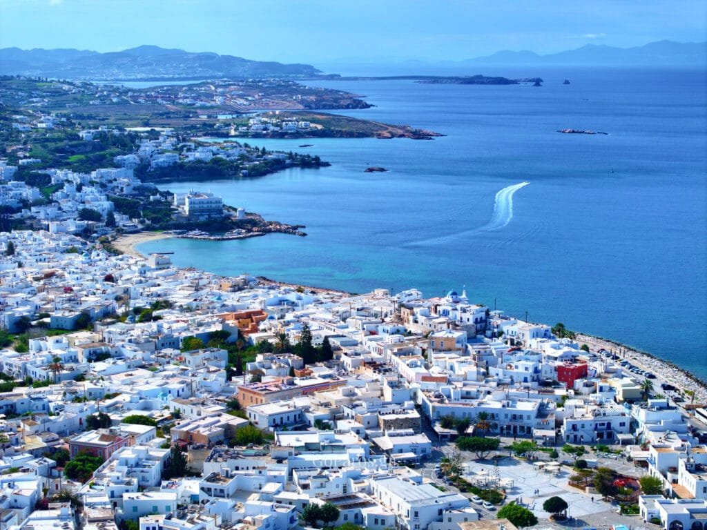 Parikia, Paros, aerial view of the town and coastline with the bay and open sea