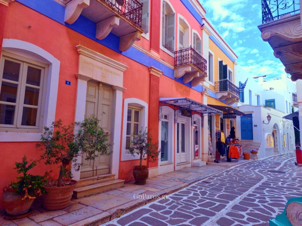 Parikia, Paros, colorful neoclassical buildings and stone-paved shopping street