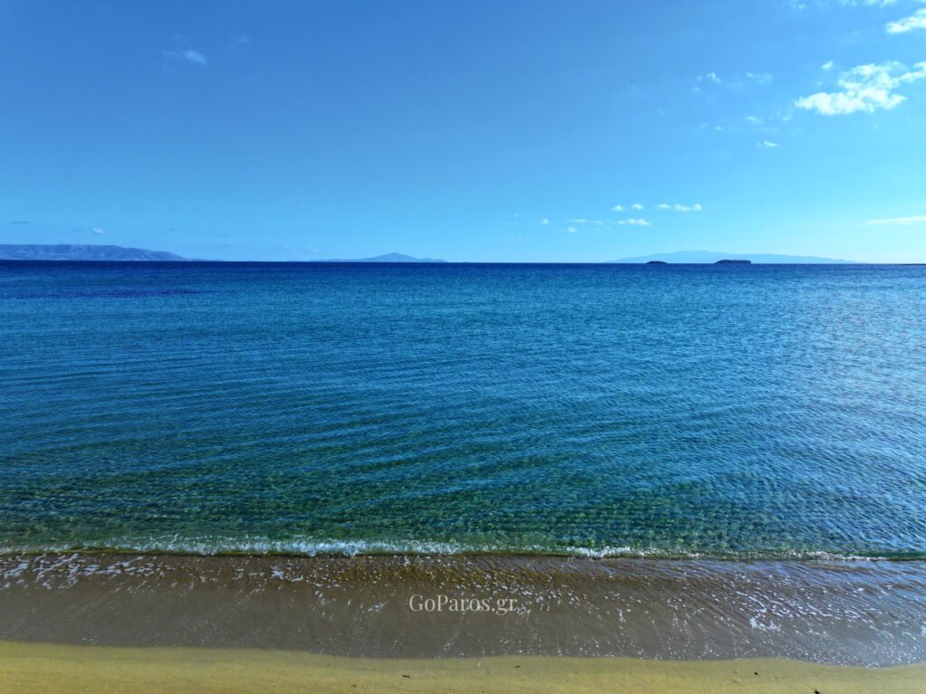Sea view from the shore at Punda Beach East, Paros, looking out to the horizon.