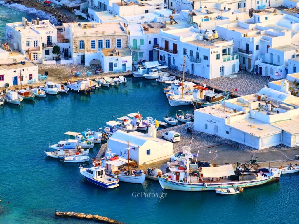 Naoussa Old Port, Paros, aerial view of fishing boats and waterfront buildings