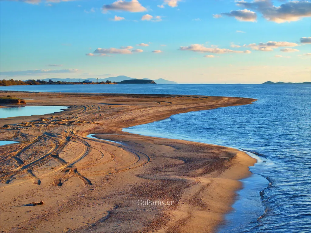 Pounda Beach West, Paros, curving sandbar and calm water with islands on the horizon
