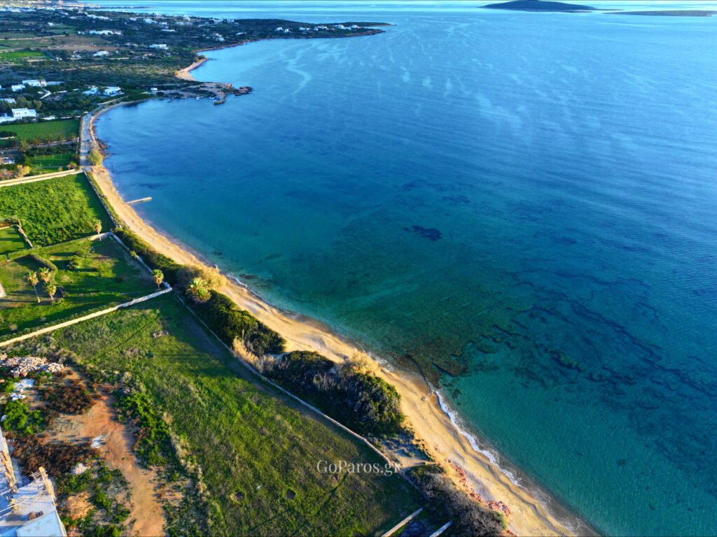 Voutakos Beach, Paros, aerial view of the sandbar with tire tracks and shallow blue water