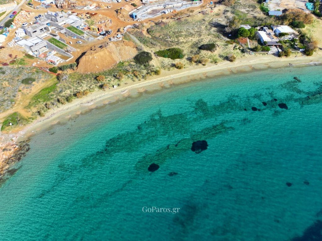 Aerial view of Marcello Beach bay and shoreline, Paros.