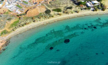 Aerial view of Marcello Beach bay and shoreline, Paros.