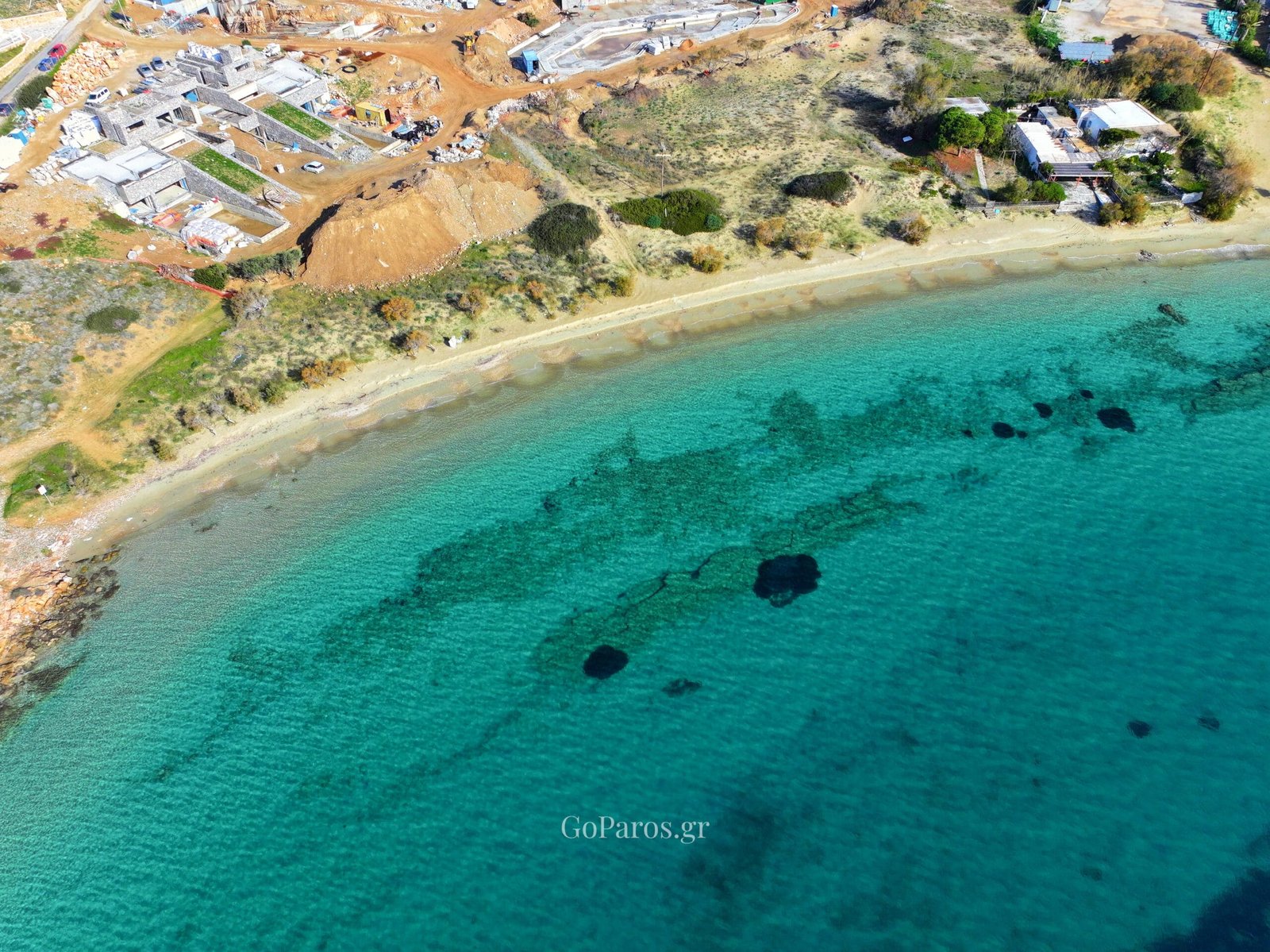 Aerial view of Marcello Beach bay and shoreline, Paros.