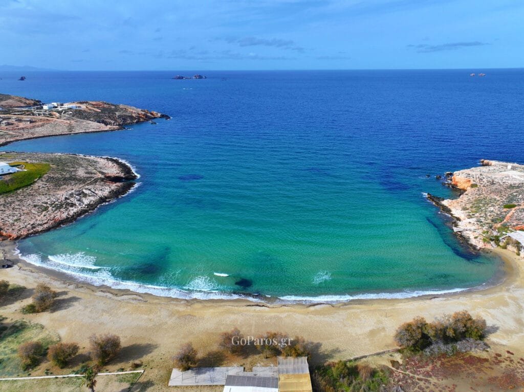 Aerial panorama of Parasporos Beach bay and turquoise water, Paros.