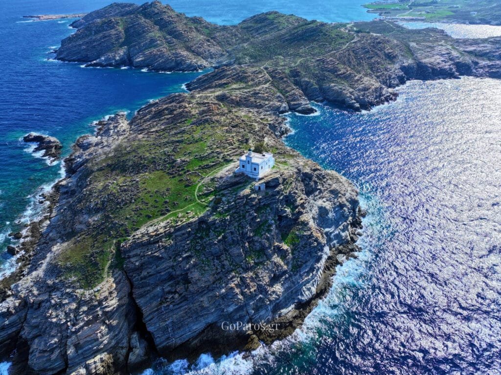 Wide aerial view of the Paros Park lighthouse and peninsula, Paros.