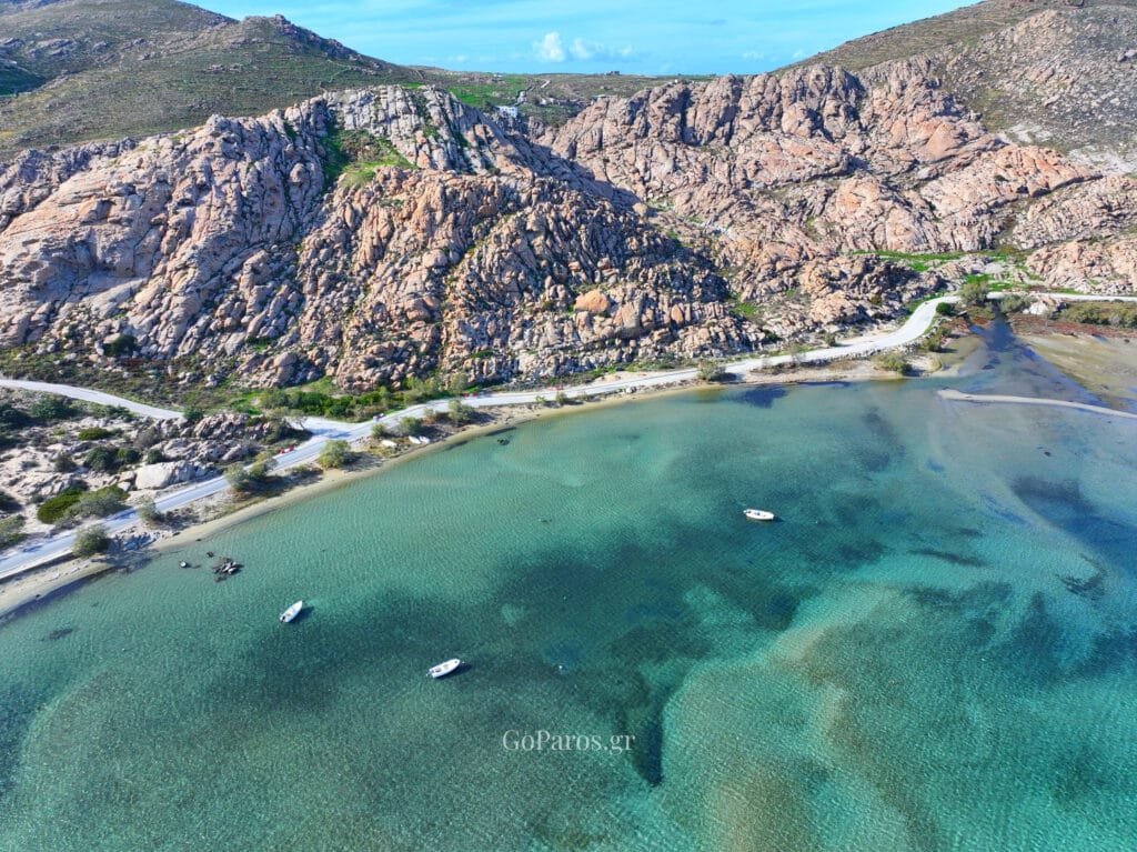 Shallow bay with small boats near Paros Park, Paros.