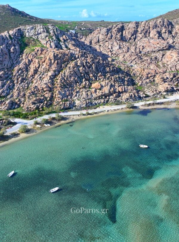 Shallow bay with small boats near Paros Park, Paros.