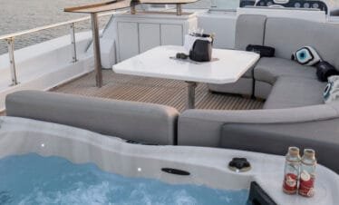 Private yacht cruise in Paros, aft deck lounge and jacuzzi on Akhir 27.