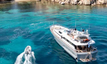 Akhir 27 yacht in Paros, aerial bay anchorage view.