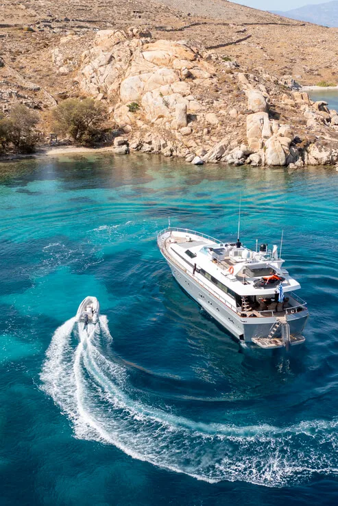 Akhir 27 yacht in Paros, aerial bay anchorage view.