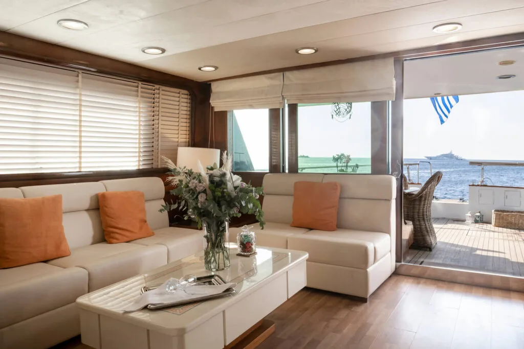 Akhir 27 yacht interior, main salon lounge seating.