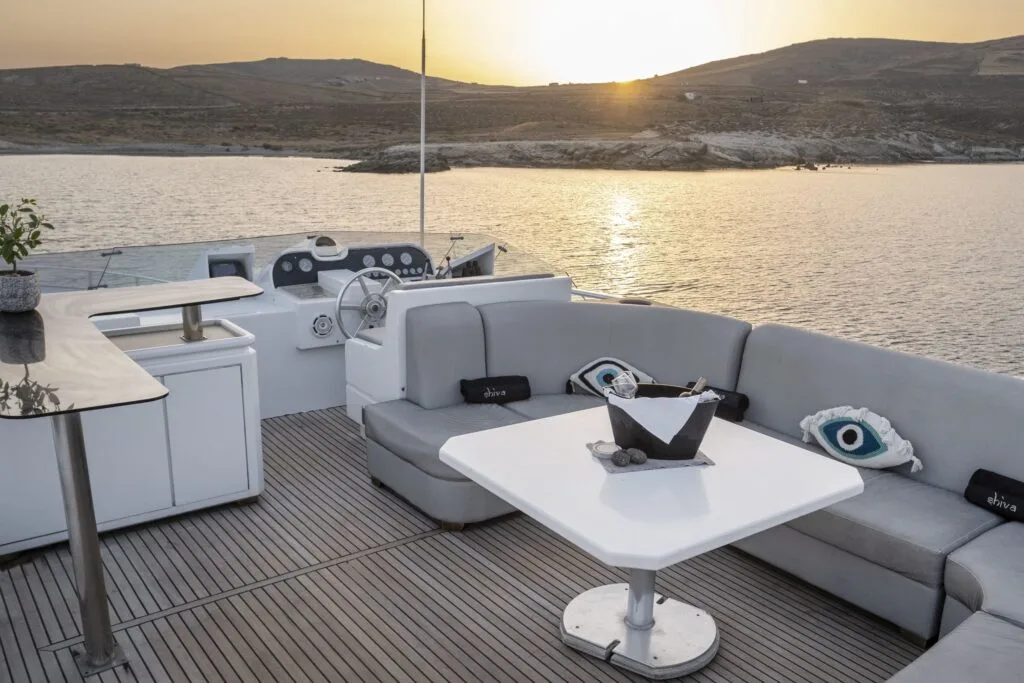 Akhir 27 yacht in Paros, sundeck seating and helm area.