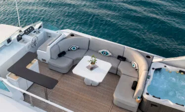 Akhir 27 yacht in Paros, deck jacuzzi and lounge.