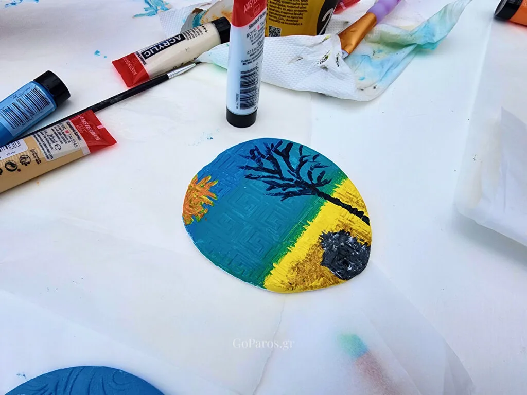 Painted handmade clay keepsake created during a pottery workshop in Paros