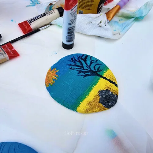 Painted handmade clay keepsake created during a pottery workshop in Paros