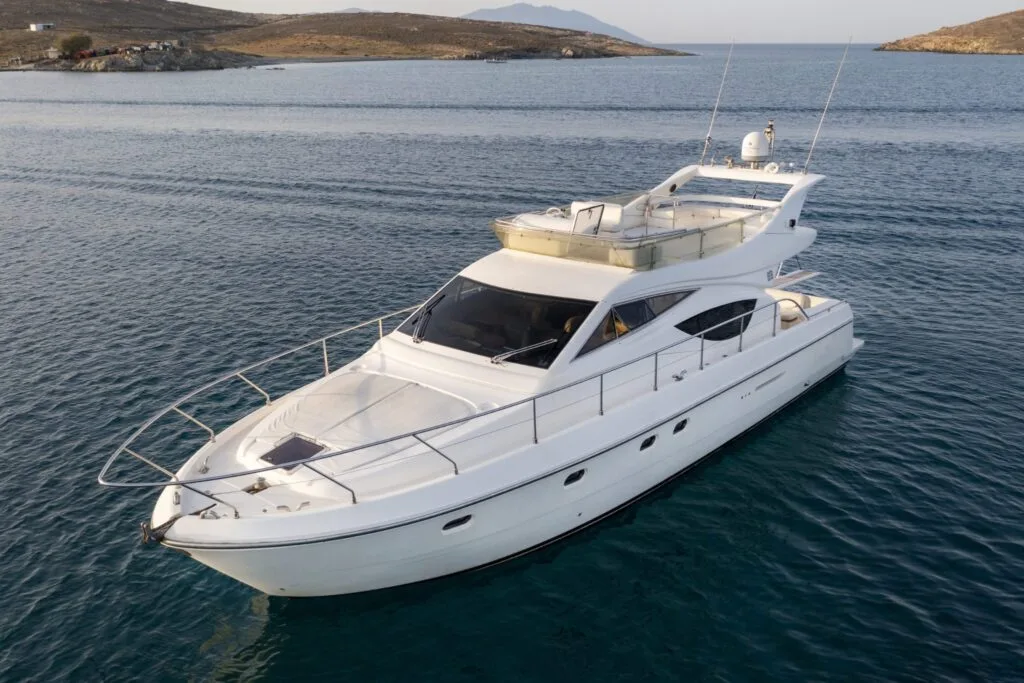 Ferretti 46 private yacht cruise in Paros, aerial exterior view.