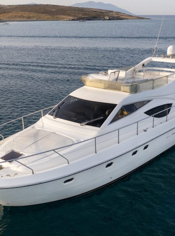 Ferretti 46 private yacht cruise in Paros, aerial exterior view.