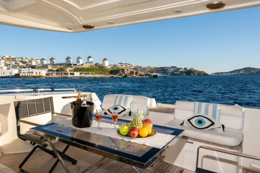 Aft deck cocktails and fruit on a Ferretti 46, private yacht cruise in Paros.