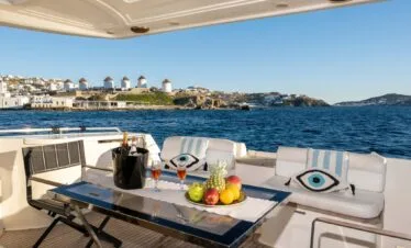 Aft deck cocktails and fruit on a Ferretti 46, private yacht cruise in Paros.