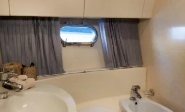 Bathroom on a Ferretti 46 yacht, private yacht cruise in Paros.