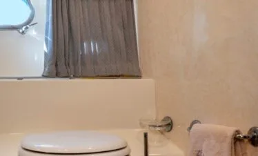 Second bathroom on a Ferretti 46 yacht, private yacht cruise in Paros.