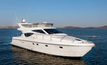 Ferretti 46 exterior side profile, private yacht cruise in Paros.