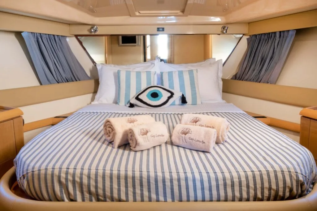 Master cabin on a Ferretti 46, private yacht cruise in Paros.