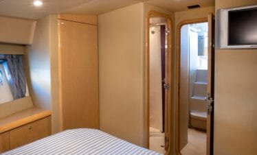 Master cabin doorway and ensuite on a Ferretti 46 yacht in Paros.