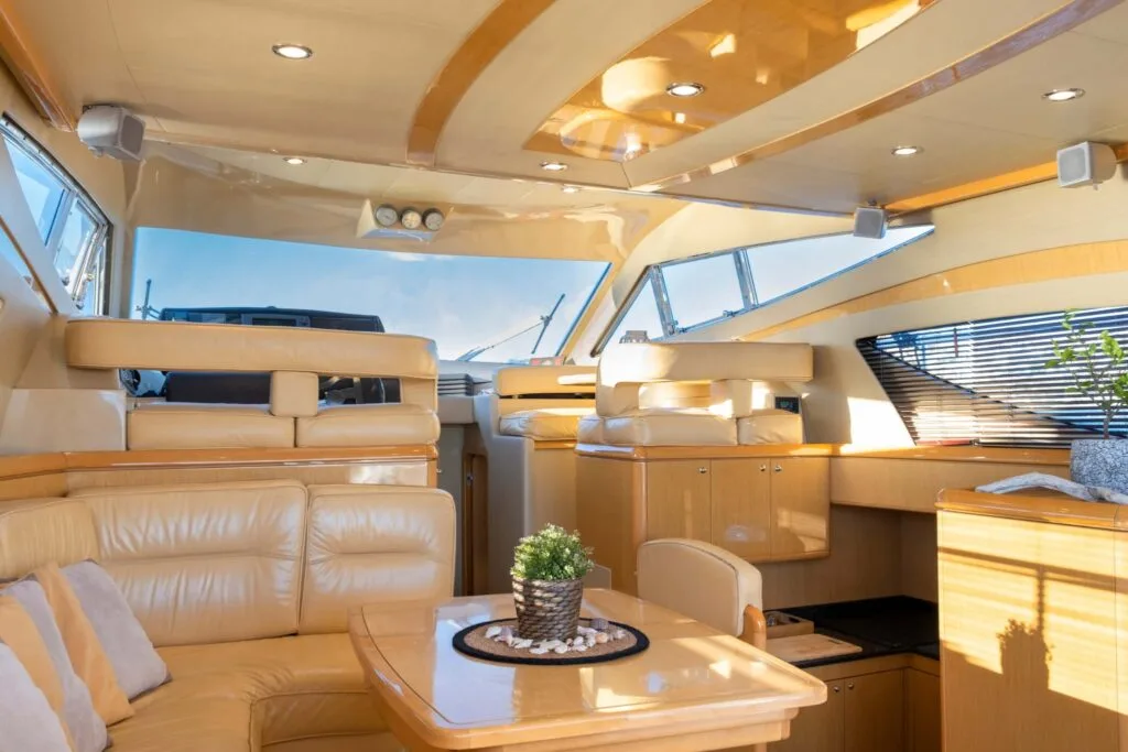 Main salon lounge on a Ferretti 46 yacht, private yacht cruise in Paros.