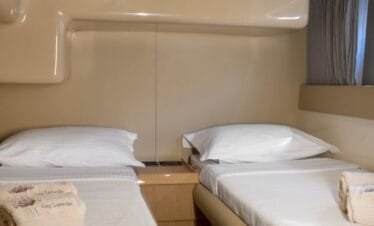 Twin cabin on a Ferretti 46, private yacht cruise in Paros.