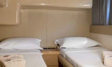 Twin cabin on a Ferretti 46, private yacht cruise in Paros.
